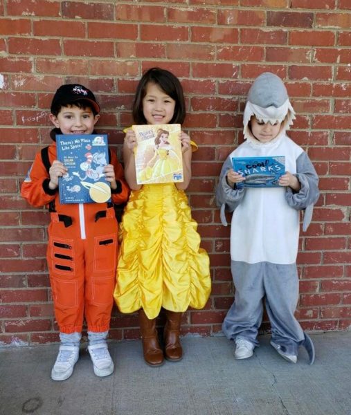 Elementary school students dressed as characters from their books