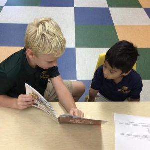 Book Buddies 4th Graders reading to PreK4 Students