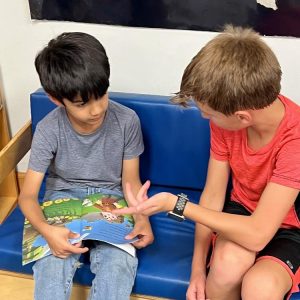 4th graders help 1st graders with reading