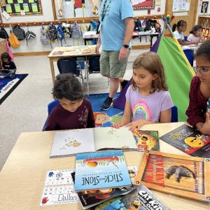 Book buddies at McGinnis Woods private school helping reading