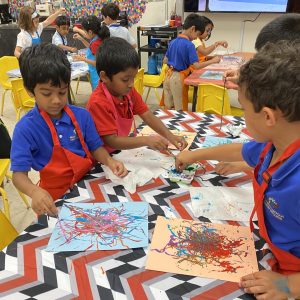 Students string painting