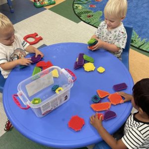 preschool students playing with shapes